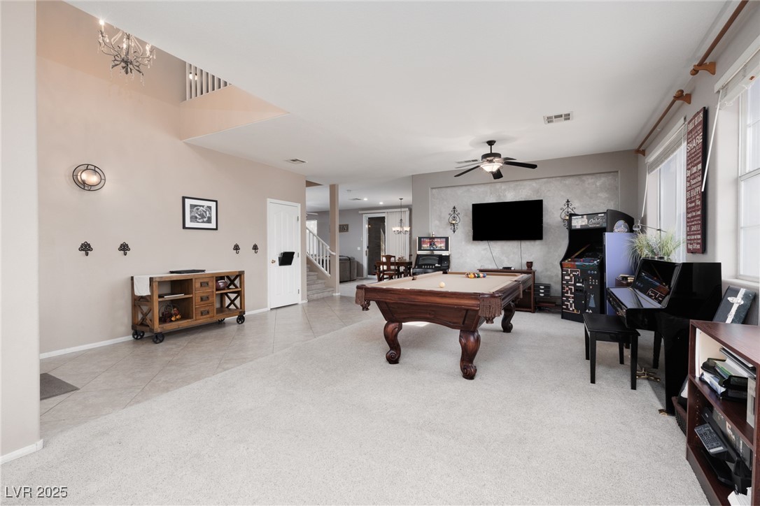 99 Milicity Road Henderson, NV 89012 - Photo 8 of 51 Playroom featuring billiards, light tile patterned flooring, light colored carpet, and ceiling fan