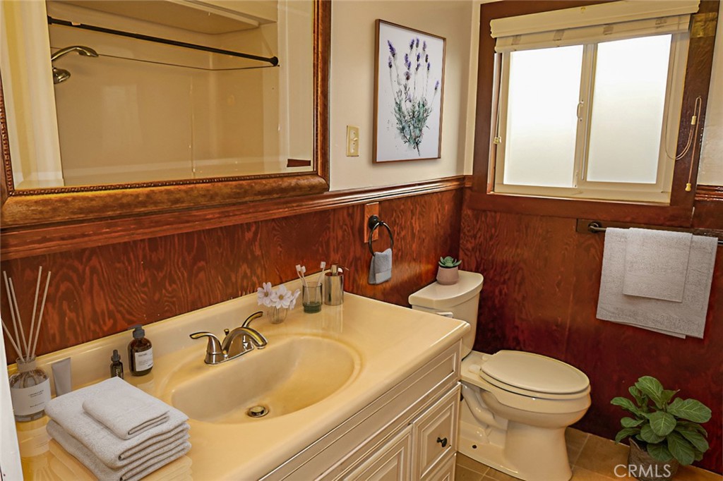 1239 Broadway Street Chico, CA 95928 - Photo 15 of 36 a bathroom with a sink and a toilet