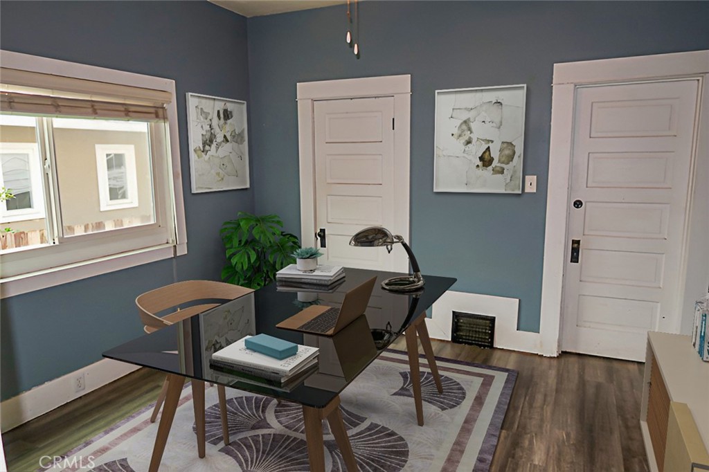 1239 Broadway Street Chico, CA 95928 - Photo 20 of 36 a view of a workspace room with furniture and wooden floor