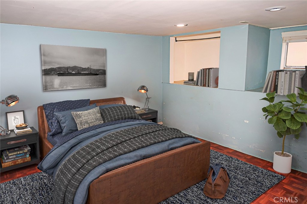 1239 Broadway Street Chico, CA 95928 - Photo 27 of 36 a bedroom with a bed painting on wall and a potted plant