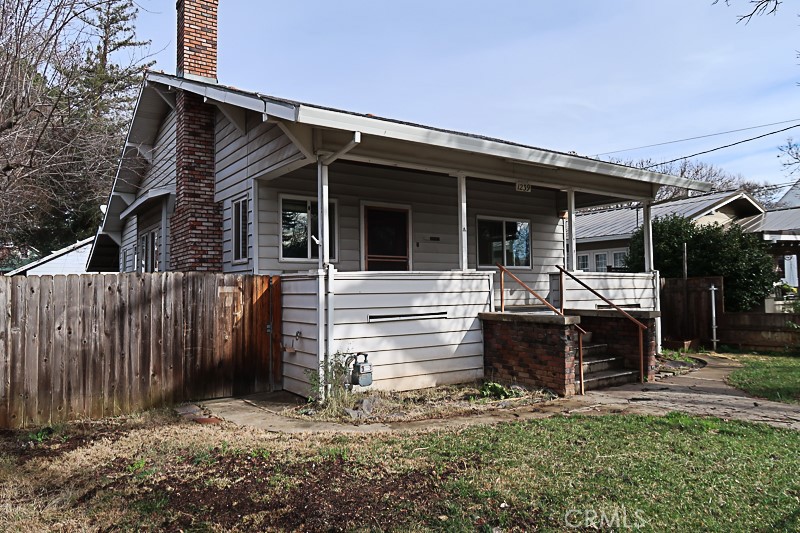 1239 Broadway Street Chico, CA 95928 - Photo 29 of 36 a view of house with a yard and furniture