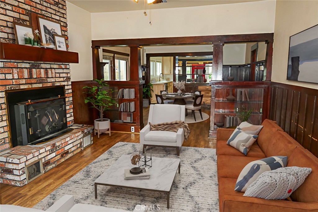 1239 Broadway Street Chico, CA 95928 - Photo 8 of 36 a living room with furniture and a fireplace