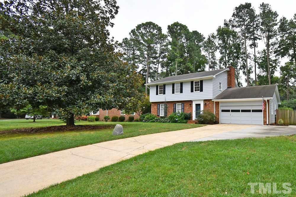 6405 Wrenwood Avenue Raleigh, NC 27607 - Photo 2 of 30 a house view with a garden space