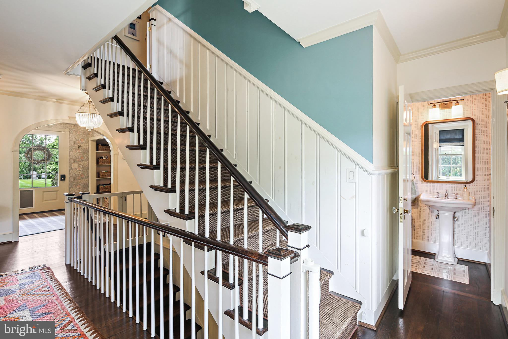 900 Army Road Baltimore, MD 21204 - Photo 22 of 99 The main stairway with new wainscoting