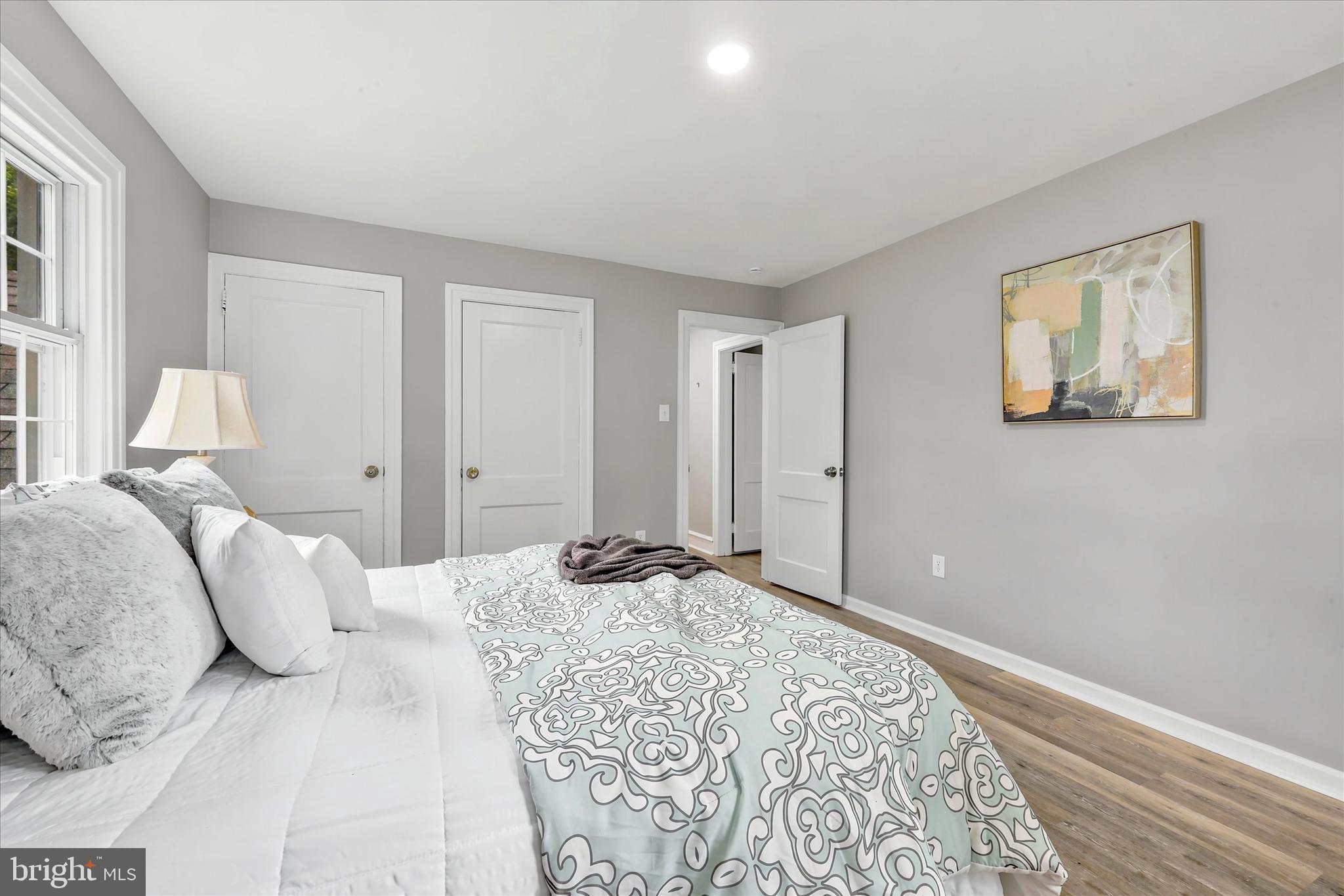 7208 Hilltop Road Upper Darby, PA 19082 - Photo 23 of 28 a bedroom with a bed and a painting on the wall