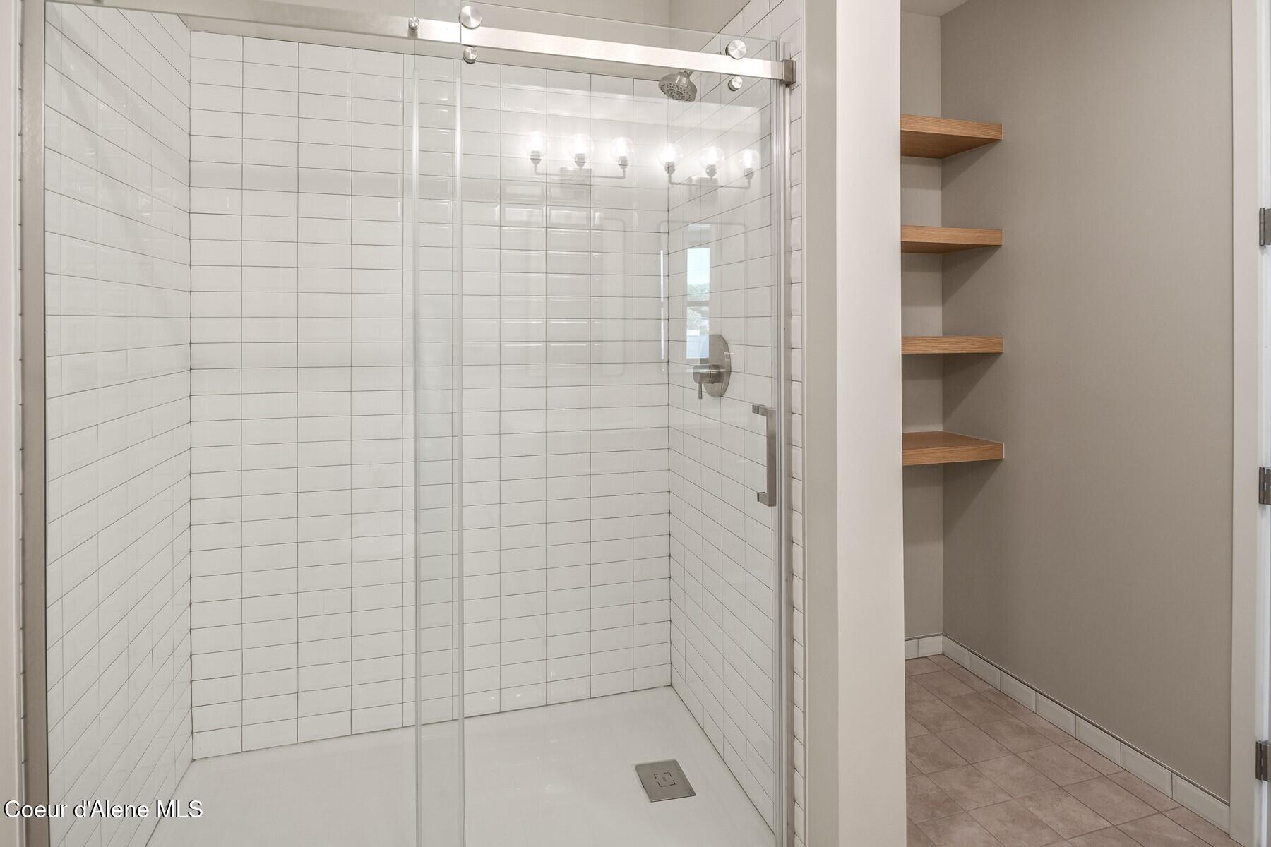 503 Cedar Street, Unit 203 Sandpoint, ID 83864 - Photo 19 of 38 Primary Bathroom Walk In Shower