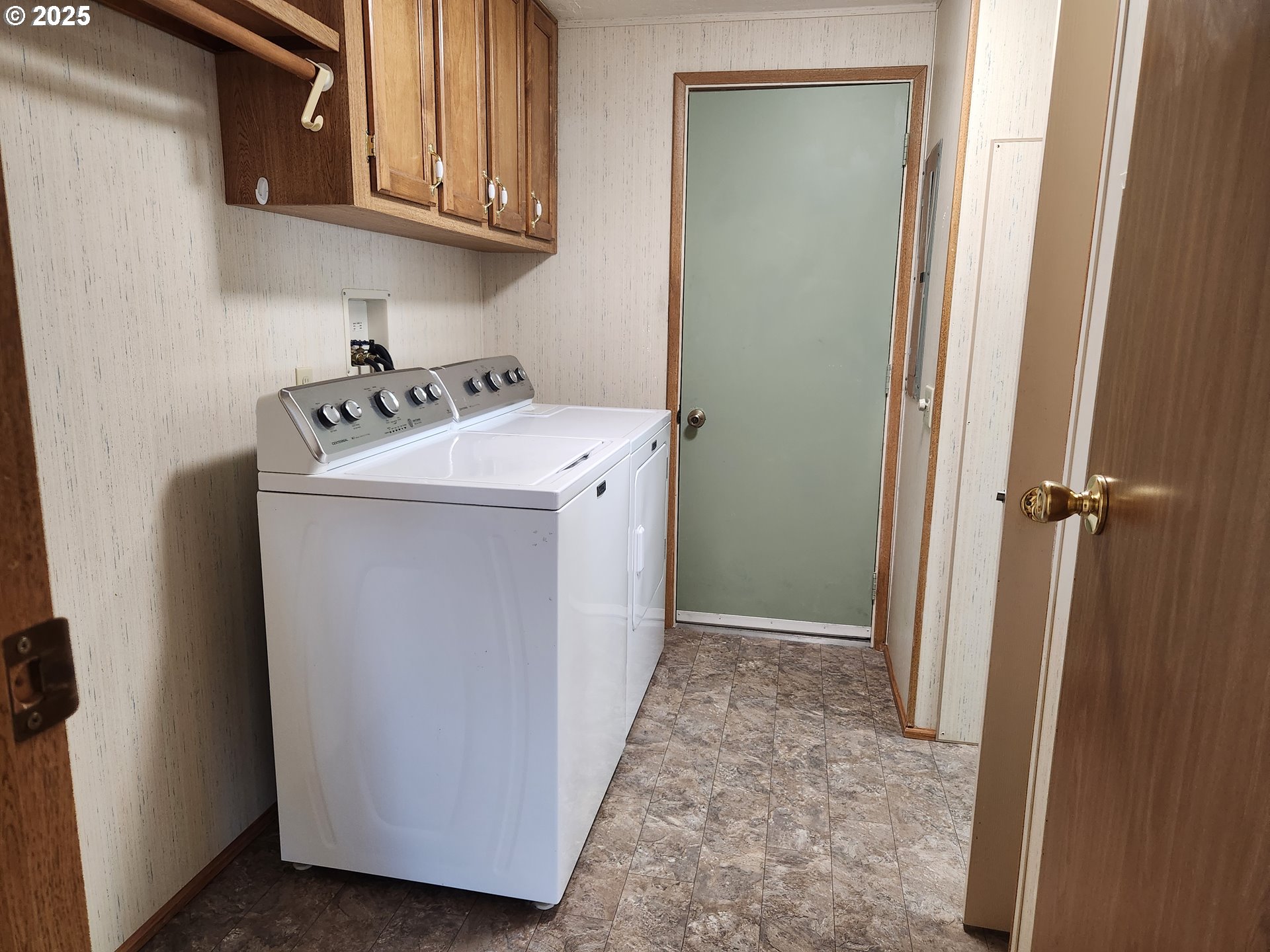 100 River Bend Road, Unit 103 Reedsport, OR 97467 - Photo 16 of 26 a utility room with dryer and washer