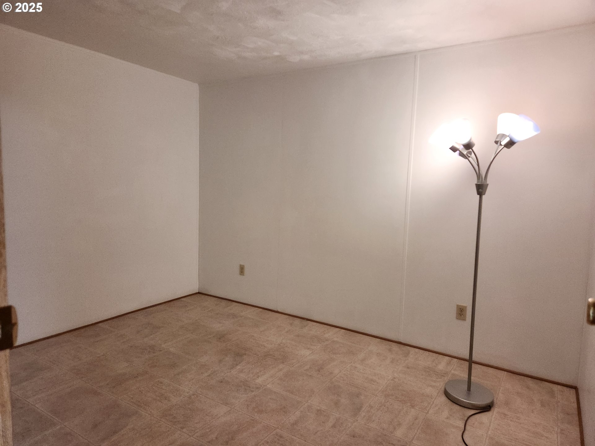 100 River Bend Road, Unit 103 Reedsport, OR 97467 - Photo 20 of 26 a view of a room with a hanging light