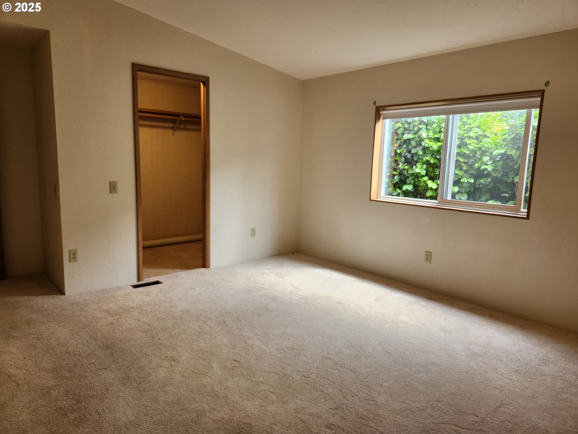 100 River Bend Road, Unit 103 Reedsport, OR 97467 - Photo 23 of 26 an empty room with a window