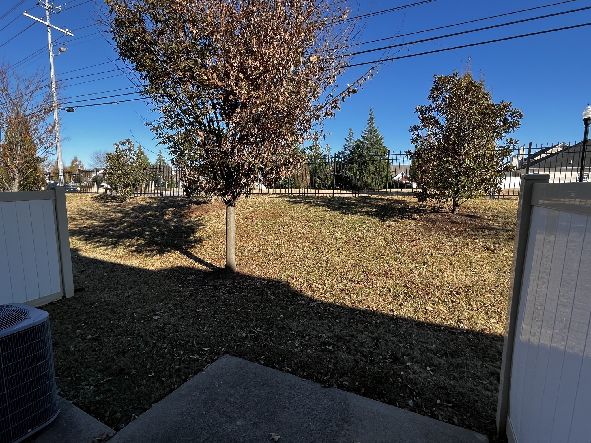 3937 Cannonsgate Lane Murfreesboro, TN 37128 - Photo 14 of 14 a view of a yard with wooden fence