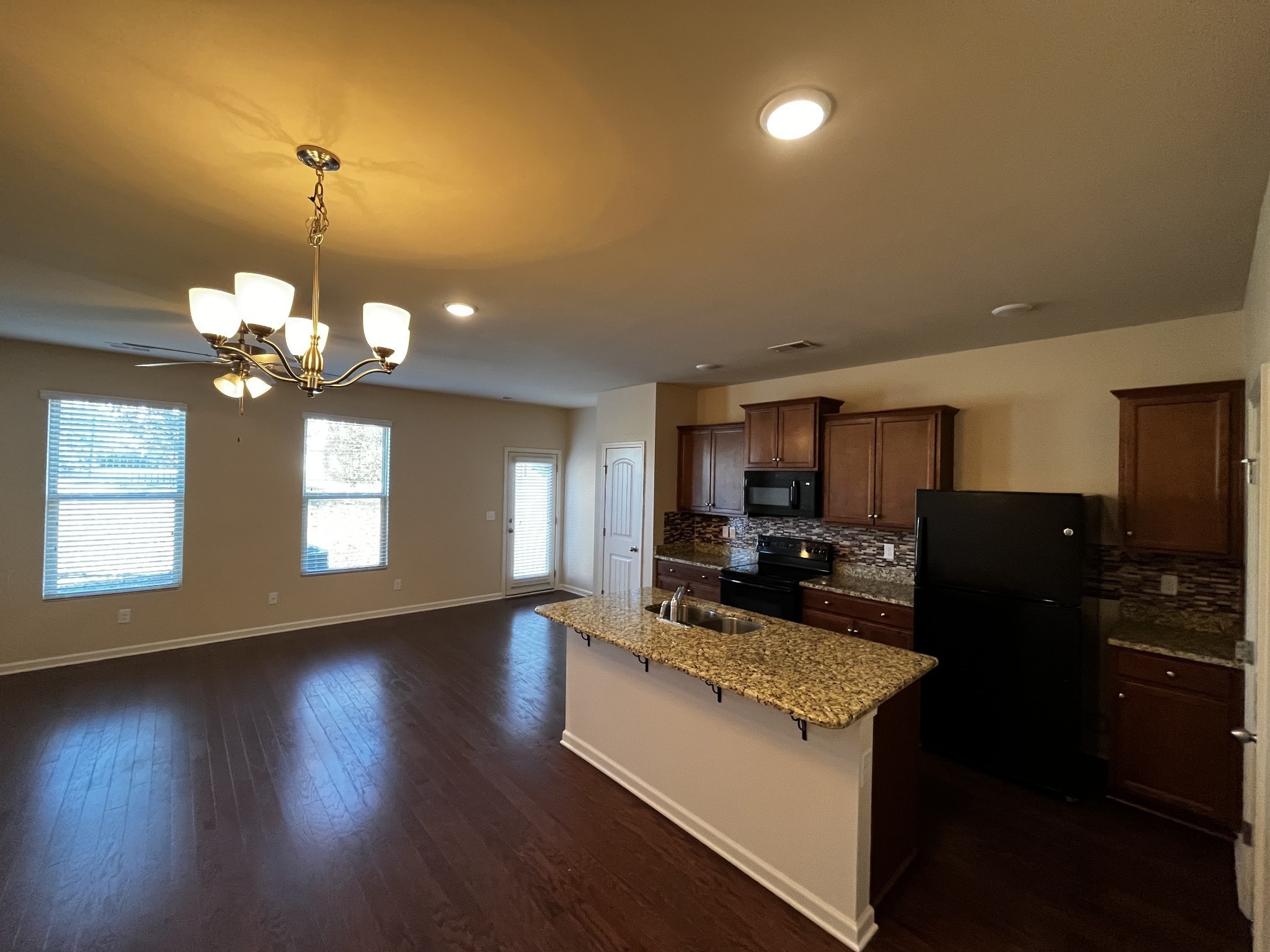 3937 Cannonsgate Lane Murfreesboro, TN 37128 - Photo 4 of 14 a kitchen with counter top space and wooden floor