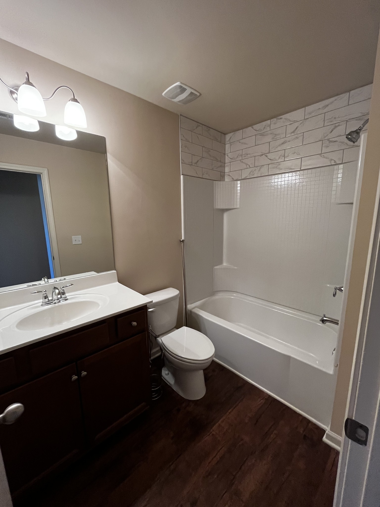 3937 Cannonsgate Lane Murfreesboro, TN 37128 - Photo 9 of 14 a bathroom with a double vanity sink toilet and shower