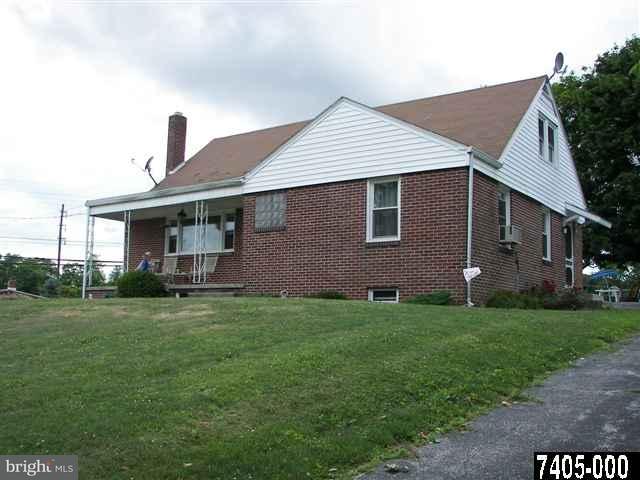 21 South Biesecker Road York, PA 17408 - Photo 1 of 18 a front view of a house with a garden