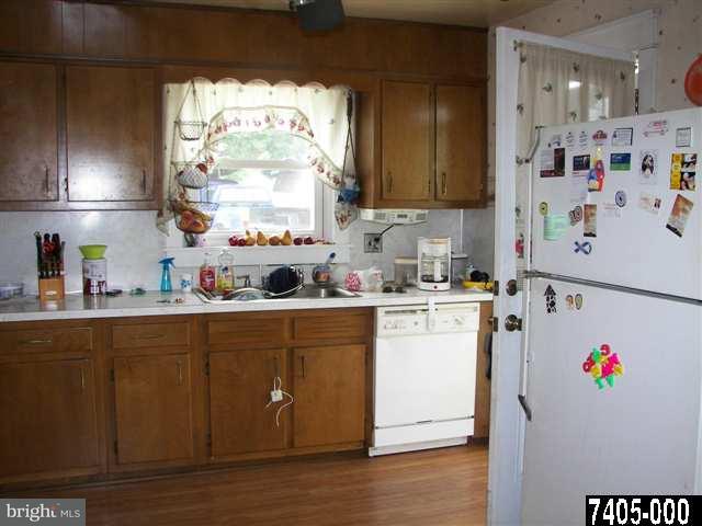 21 South Biesecker Road York, PA 17408 - Photo 11 of 18 a view of kitchen with wooden floor