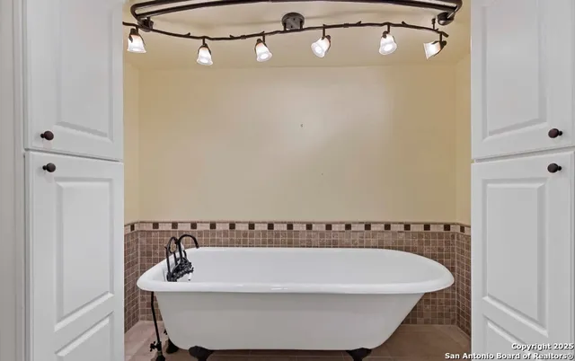 a view of a bathtub in a bathroom