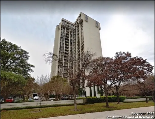 a view of a city with tall buildings