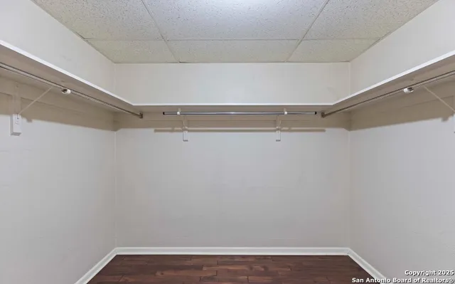 a view of a room with racks on the wall