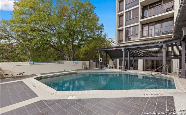 a view of a house with a swimming pool