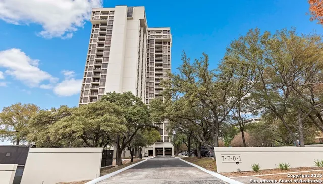 a view of a city with tall buildings