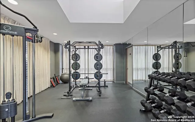 a view of a room with gym equipment
