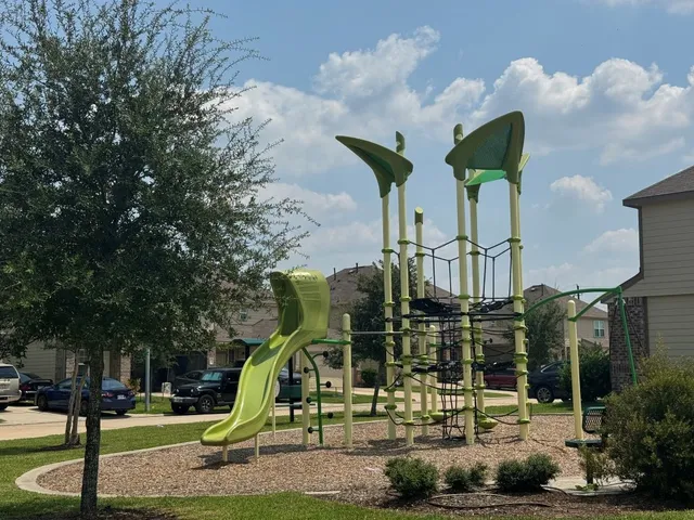 a view of a house with a park