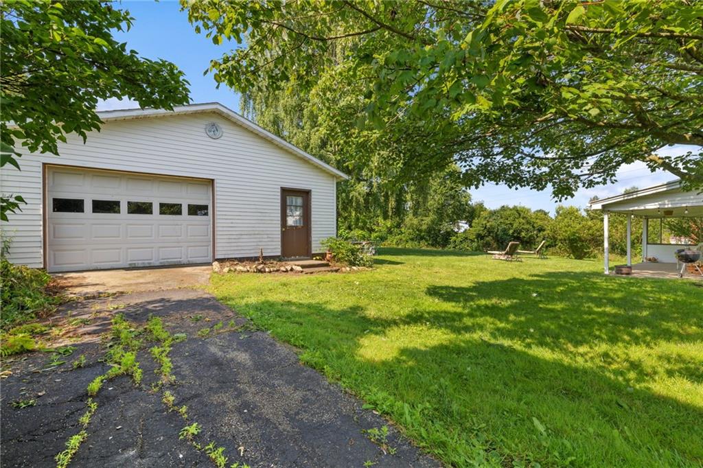 777 Main Street Addison, PA 15411 - Photo 27 of 35 a backyard of a house with table and chairs