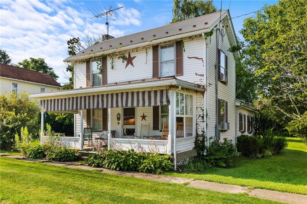 777 Main Street Addison, PA 15411 - Photo 30 of 35 a view of a house with backyard and garden