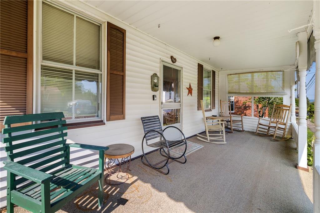 777 Main Street Addison, PA 15411 - Photo 3 of 35 a living room with furniture and a large window