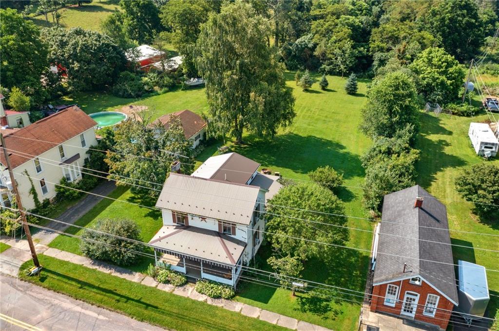 777 Main Street Addison, PA 15411 - Photo 32 of 35 an aerial view of a house with garden space and street view
