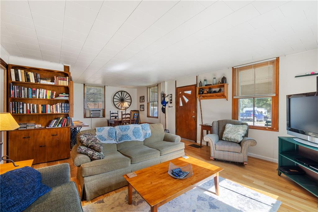 777 Main Street Addison, PA 15411 - Photo 6 of 35 a living room with furniture and a flat screen tv