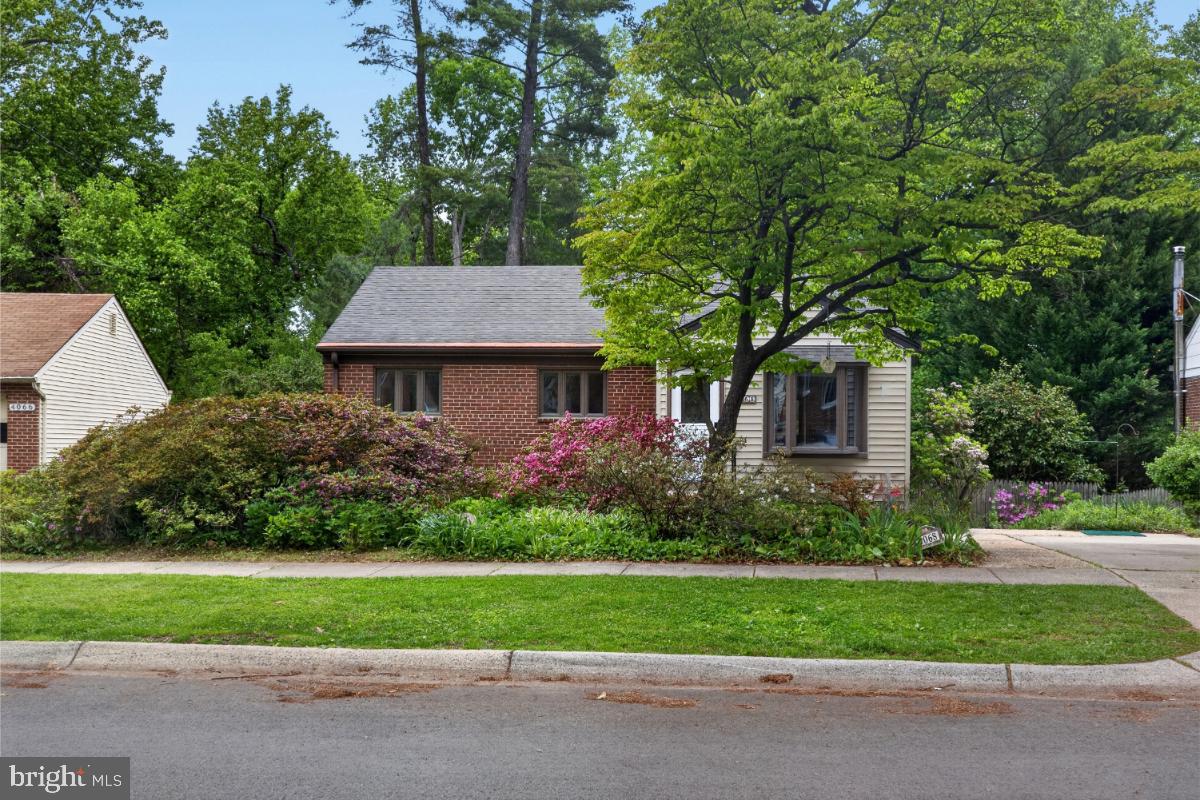 4068 Adams Drive Silver Spring, MD 20902 - Photo 4 of 43 a front view of a house with a garden