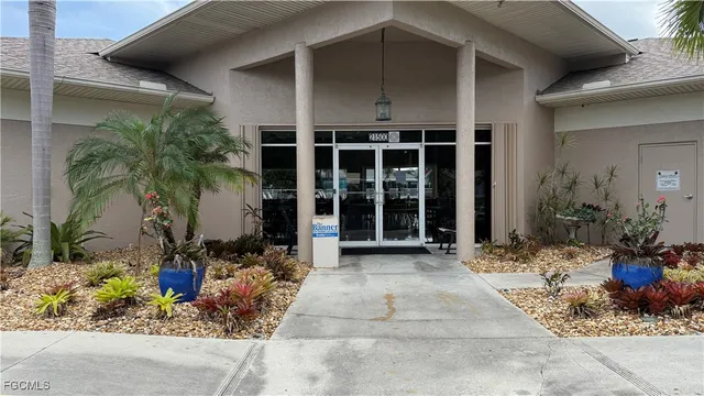 a view of a balcony with dining area