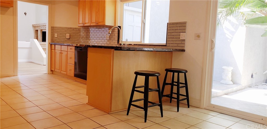 33 Valley, Unit 35 Irvine, CA 92612 - Photo 14 of 31 a view of a kitchen with furniture and window