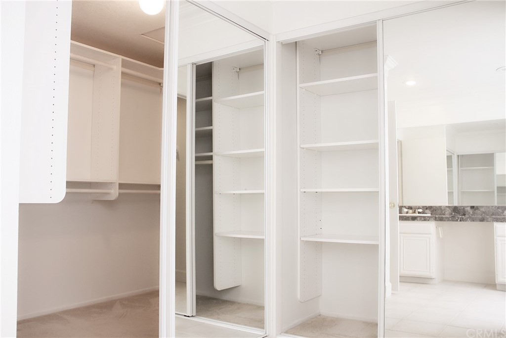 33 Valley, Unit 35 Irvine, CA 92612 - Photo 17 of 31 a view of walk in closet with empty racks