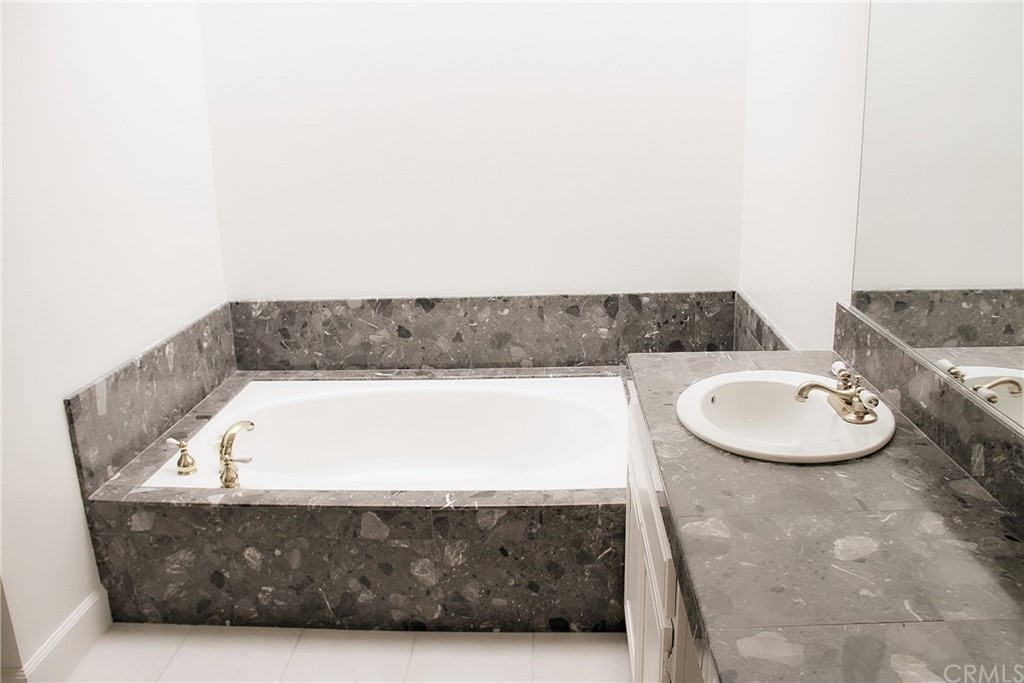 33 Valley, Unit 35 Irvine, CA 92612 - Photo 18 of 31 a view of a bath tub sitting in a bathroom