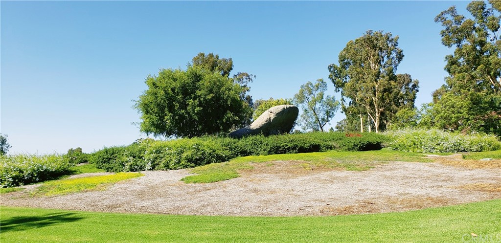 33 Valley, Unit 35 Irvine, CA 92612 - Photo 30 of 31 a view of a garden with a pathway