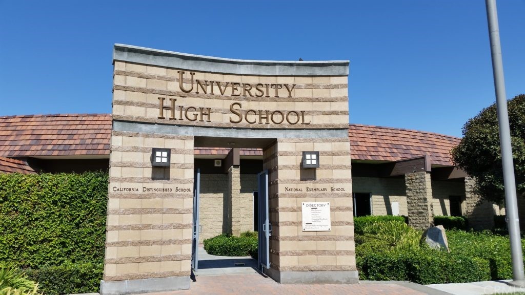 33 Valley, Unit 35 Irvine, CA 92612 - Photo 31 of 31 a front view of a building with a garden and plants
