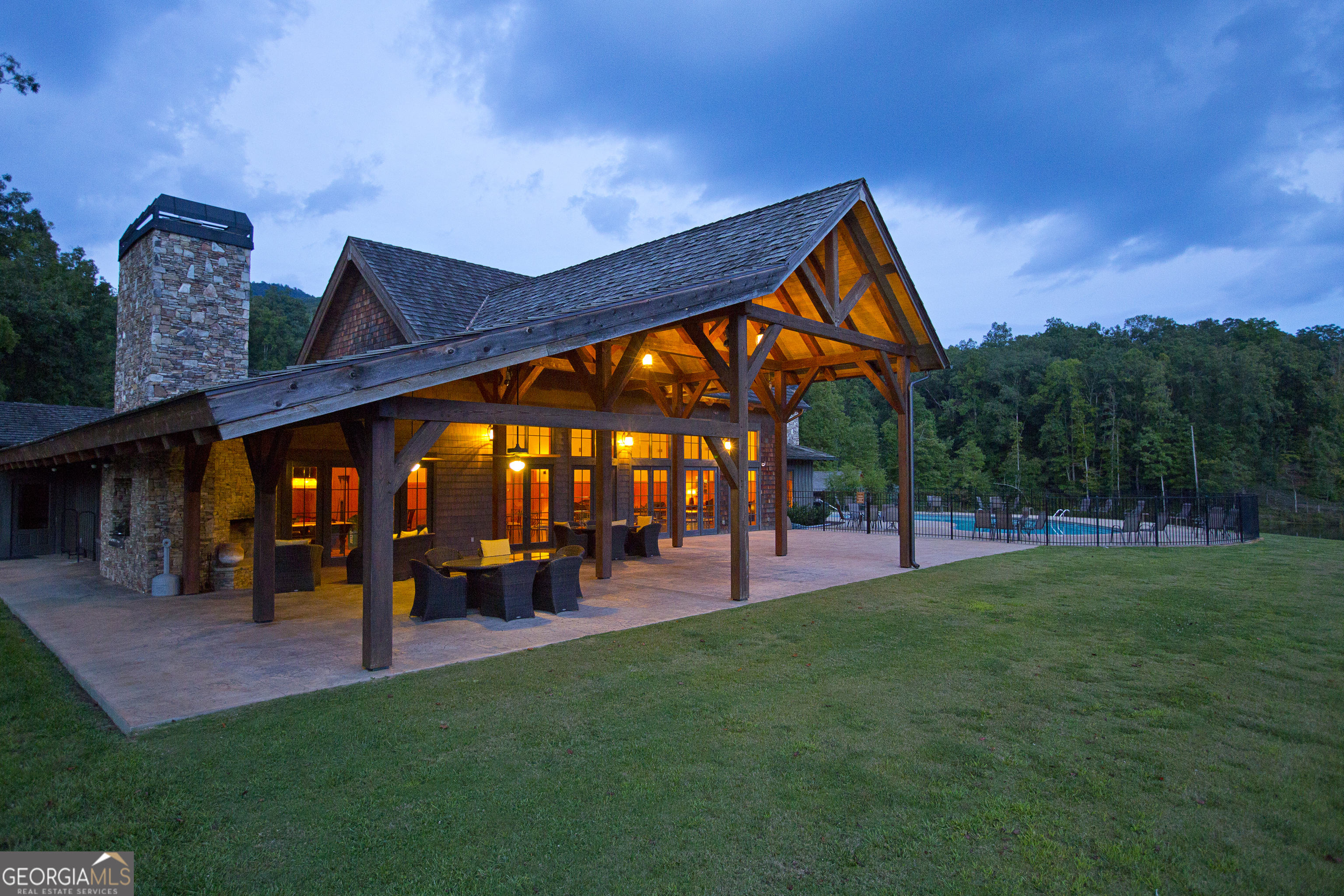0 North Laceola Road, Unit LOT 119 Cleveland, GA 30528 - Photo 10 of 21 a group of people sitting in a big yard
