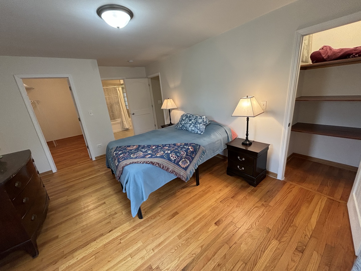 2461 Hawthorne Road Homewood, IL 60430 - Photo 13 of 37 a bedroom with a bed and a flat tv screen on wall