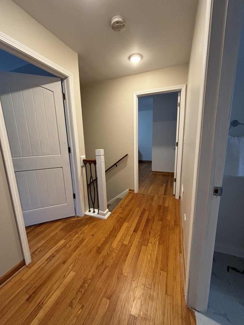 2461 Hawthorne Road Homewood, IL 60430 - Photo 17 of 37 a view of a room with wooden floor and stairs