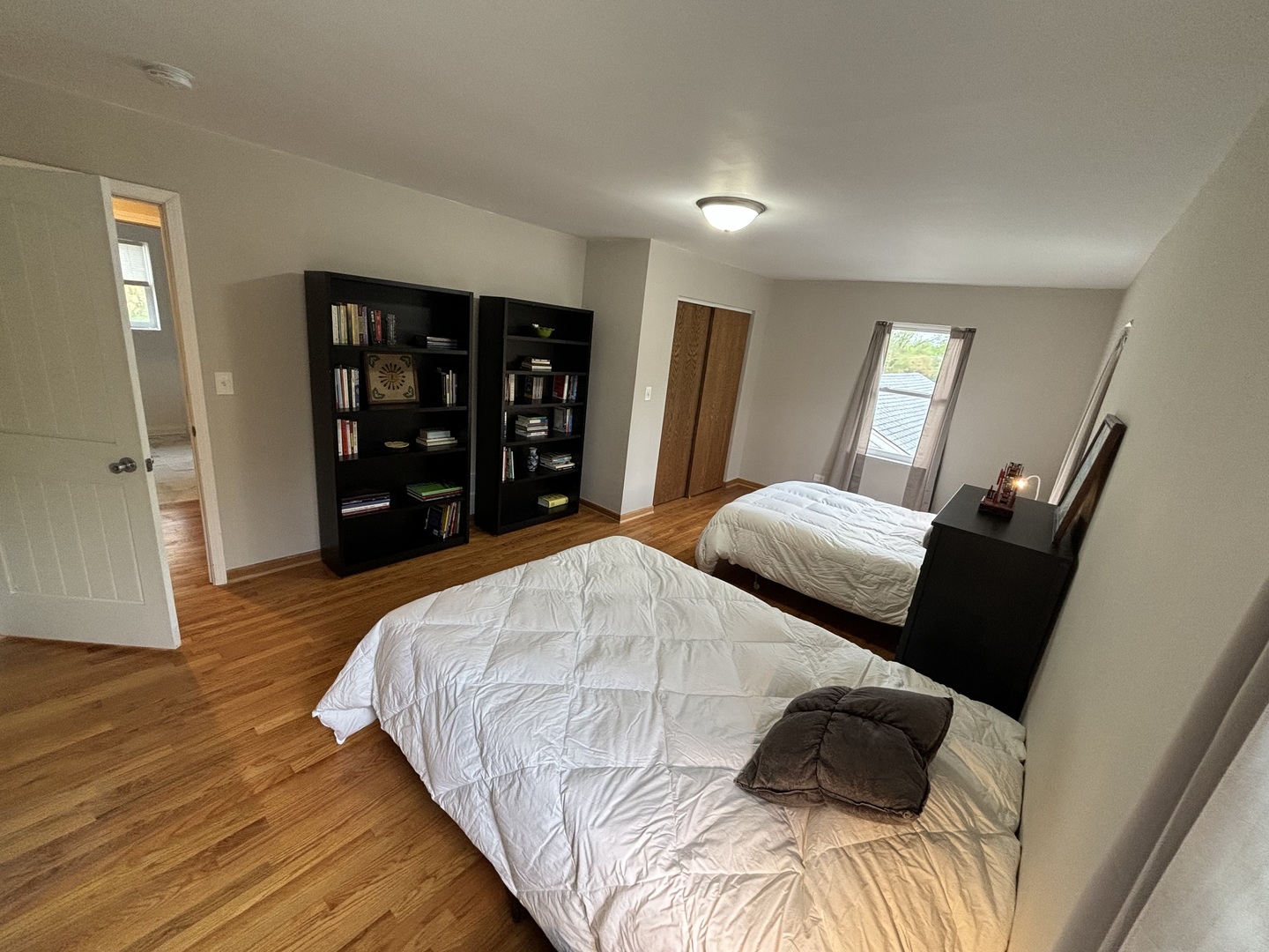 2461 Hawthorne Road Homewood, IL 60430 - Photo 26 of 37 a bedroom with a bed window and walk in closet