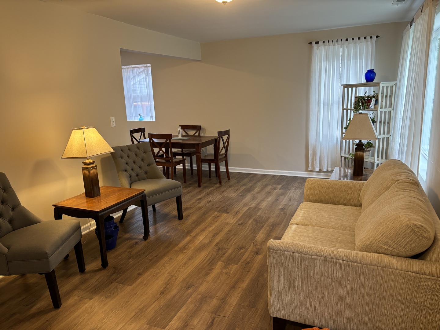 2461 Hawthorne Road Homewood, IL 60430 - Photo 3 of 37 a living room with furniture a lamp and a potted plant
