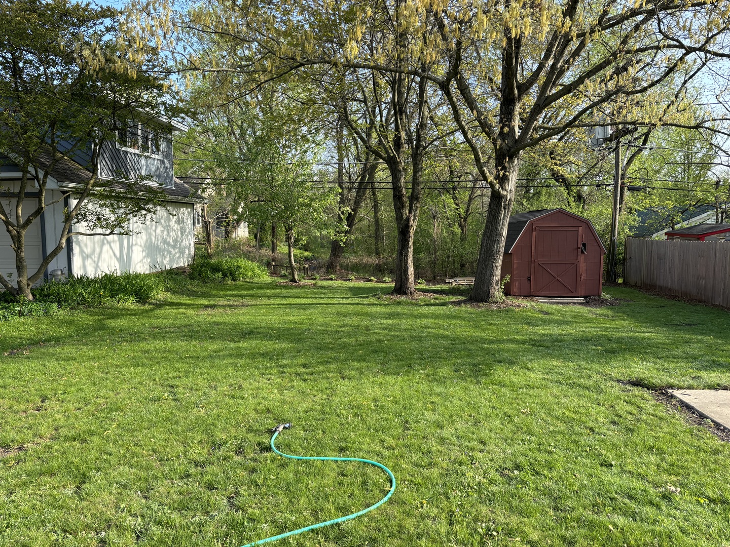 2461 Hawthorne Road Homewood, IL 60430 - Photo 34 of 37 a backyard of a house with table and chairs