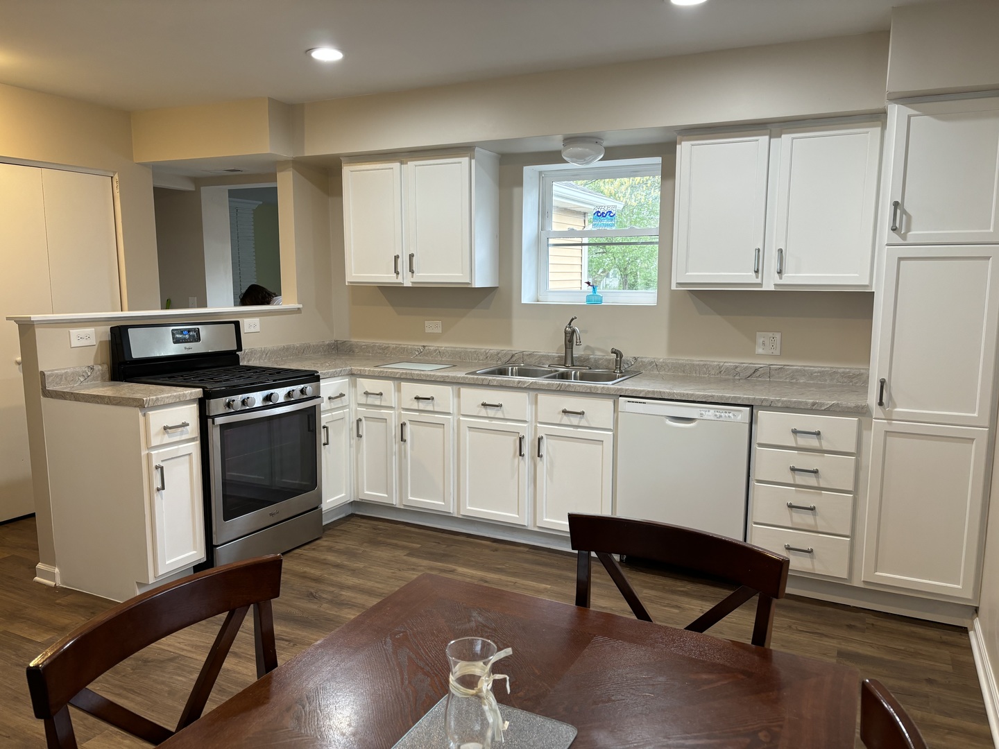 2461 Hawthorne Road Homewood, IL 60430 - Photo 5 of 37 a kitchen with a stove a sink and a refrigerator