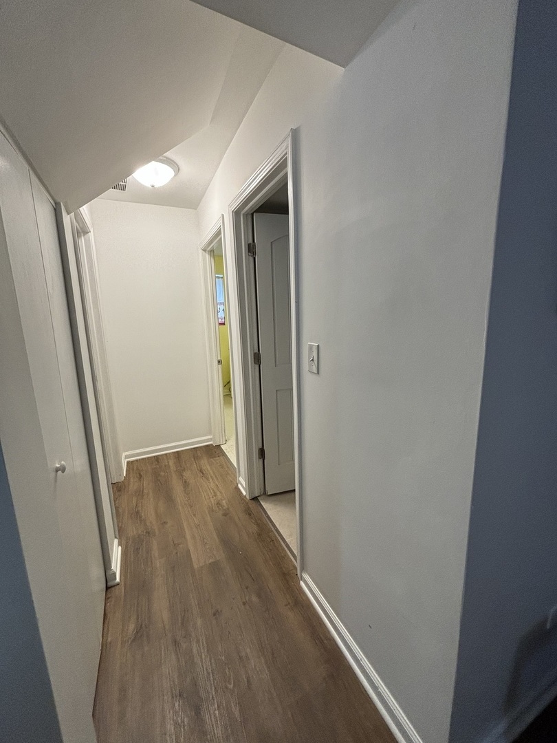 2461 Hawthorne Road Homewood, IL 60430 - Photo 9 of 37 a view of hallway with wooden floor