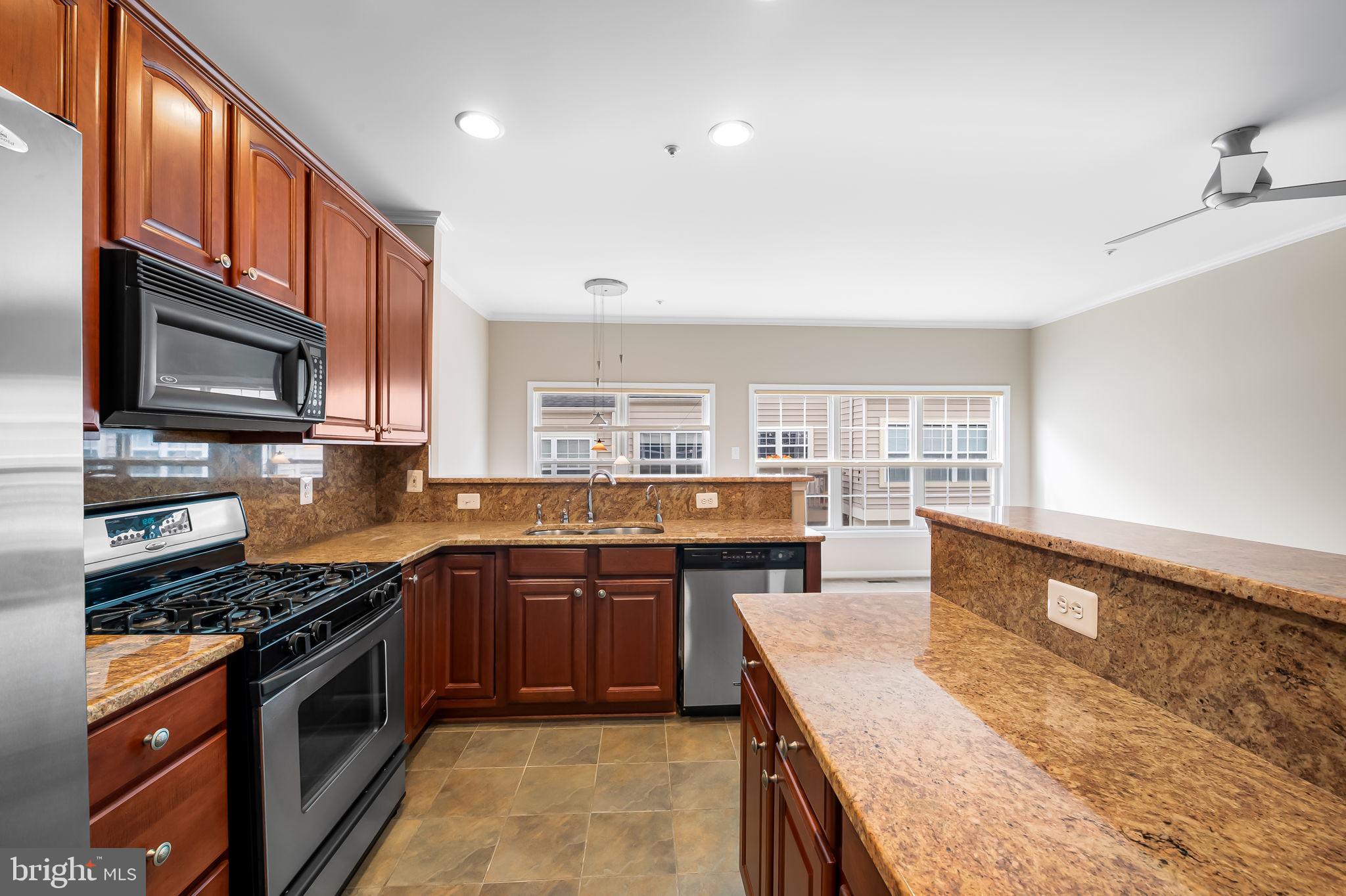 10257 Rutland Round Road, Unit 38 Columbia, MD 21044 - Photo 16 of 43 Kitchen With Island