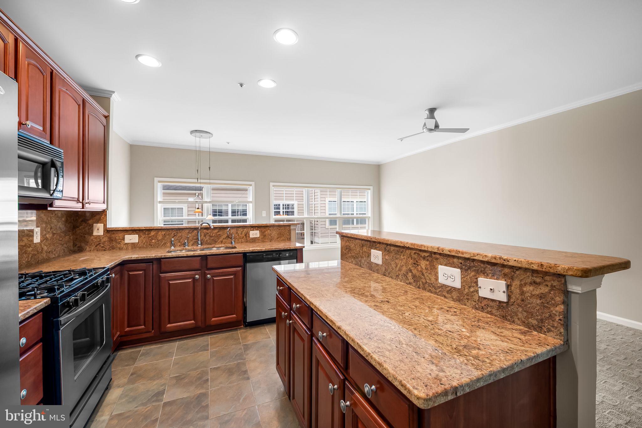 10257 Rutland Round Road, Unit 38 Columbia, MD 21044 - Photo 17 of 43 Kitchen With Island