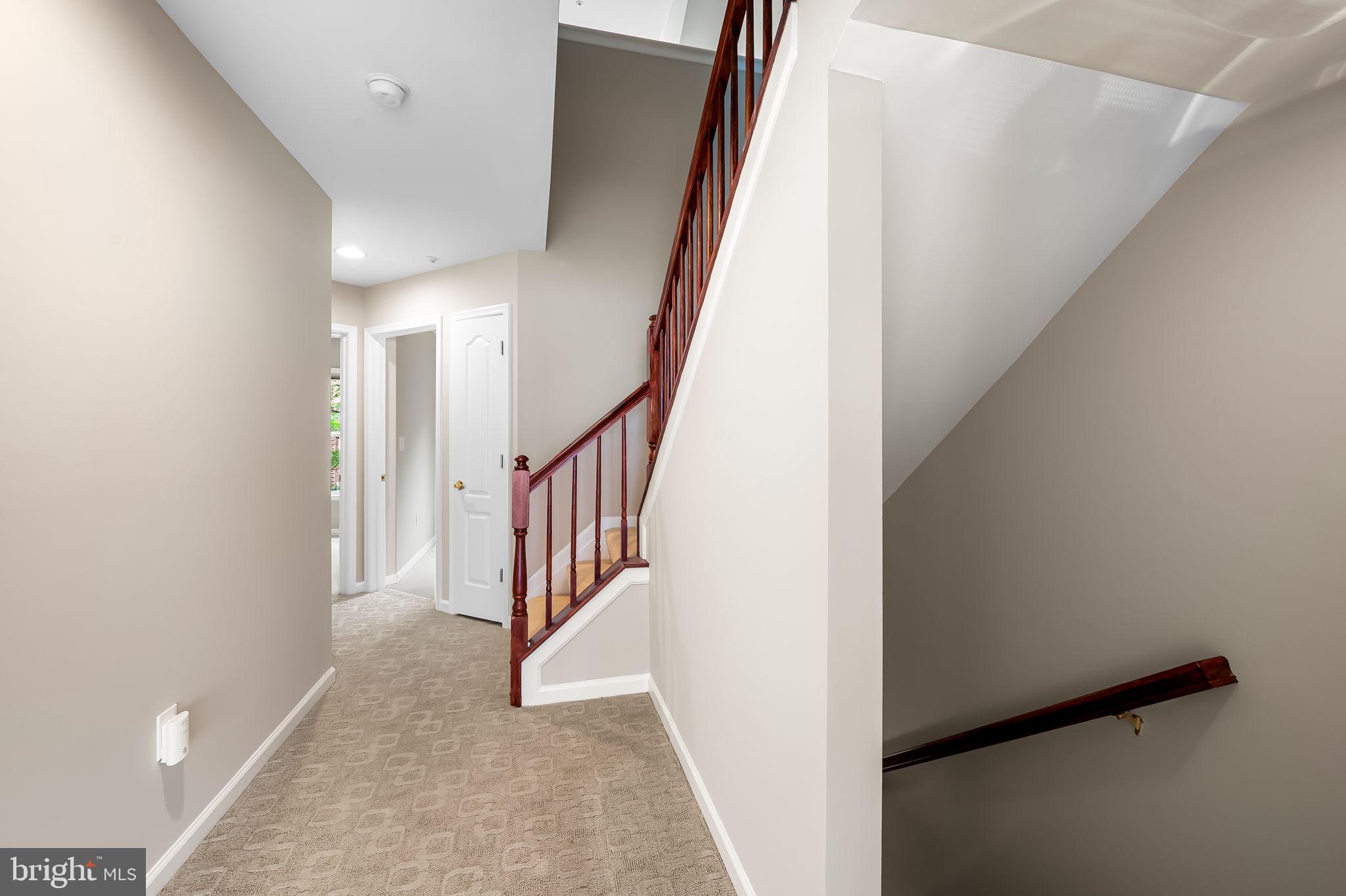 10257 Rutland Round Road, Unit 38 Columbia, MD 21044 - Photo 26 of 43 Upstairs Hallway