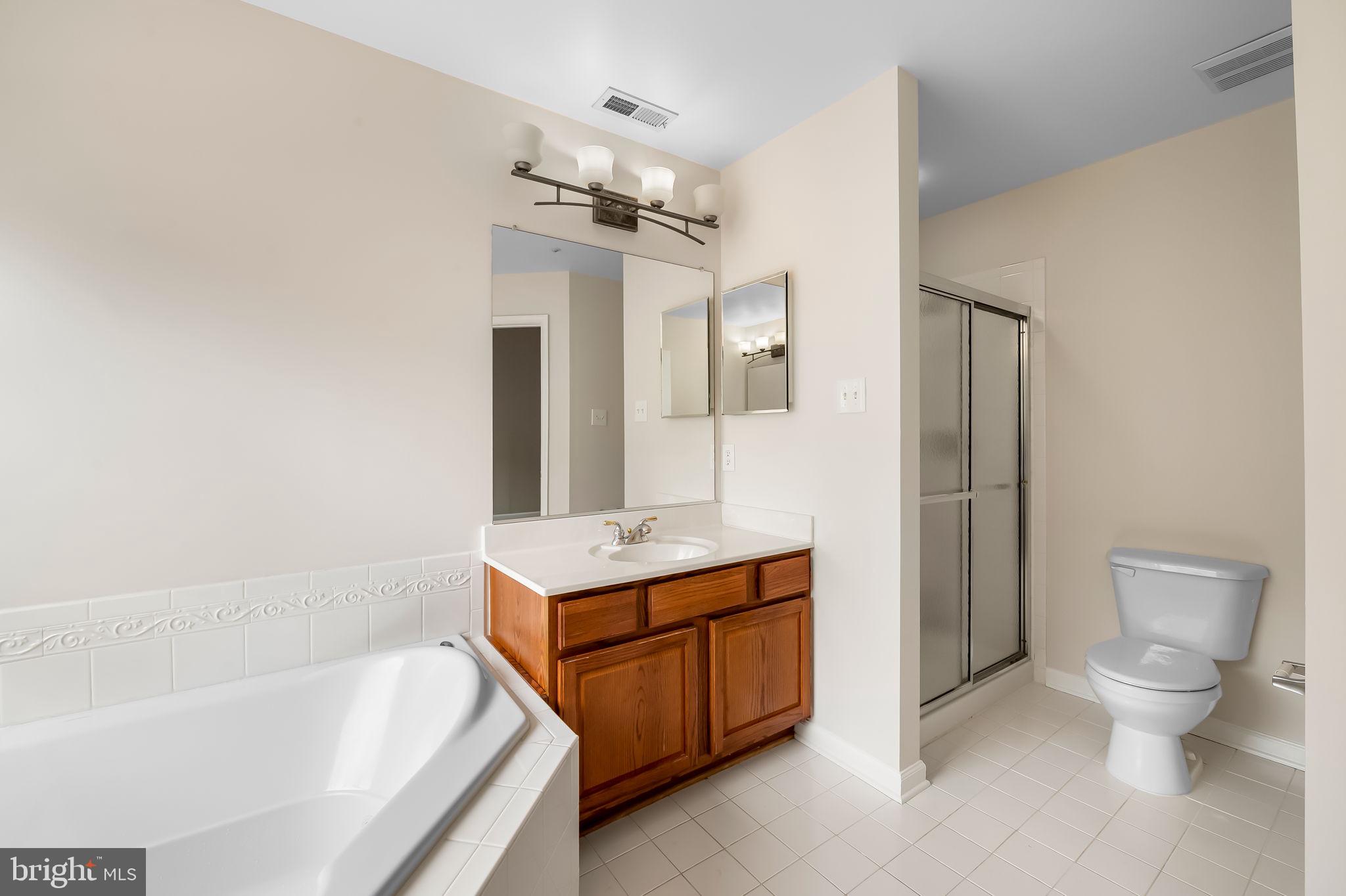 10257 Rutland Round Road, Unit 38 Columbia, MD 21044 - Photo 36 of 43 Primary Ensuite