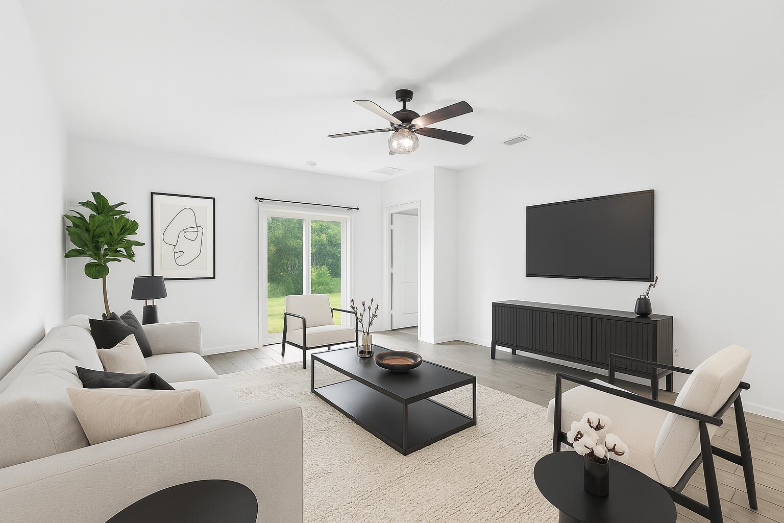 738 Worlington Lane Fort Pierce, FL 34947 - Photo 15 of 69 a living room with furniture and a flat screen tv